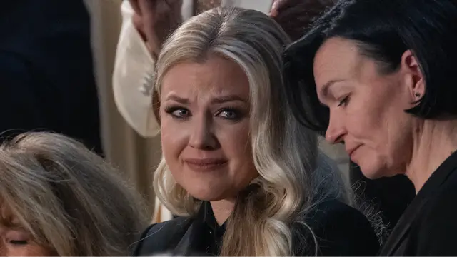 Three word phrase mouthed by Erika Kirk as she was being mentioned by Trump in State of the Union speech